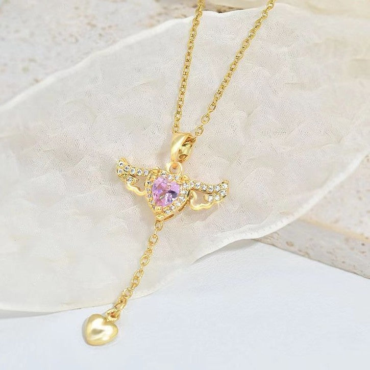 Cupid’s Heart Tassel Necklace With Movable Wings - Mari’Anna Tees