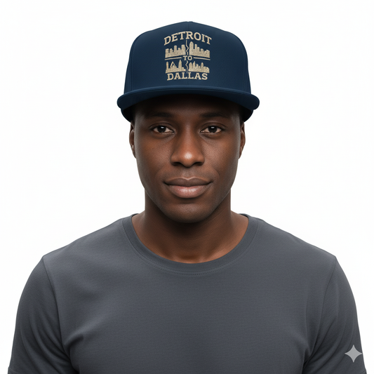 Man wearing a navy blue cap with 'Detroit to Dallas' text on a white background
