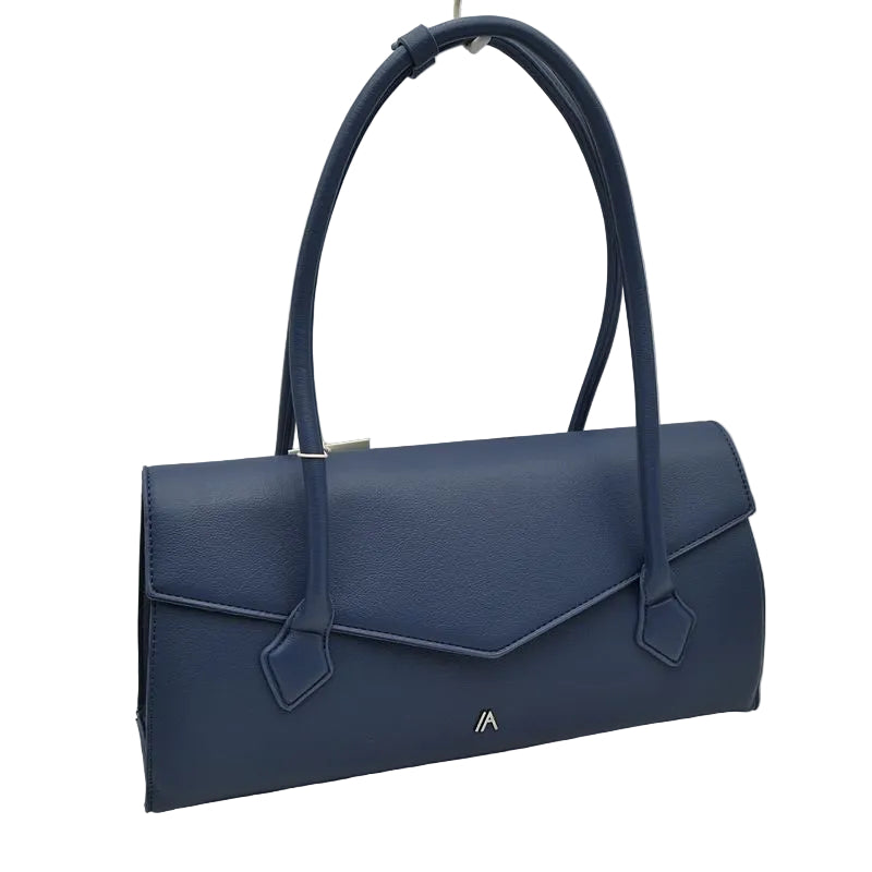 A navy blue pebbled leather handbag with a structured envelope-style flap, dual top handles, and a small gold geometric logo on the front, photographed against a neutral white background.