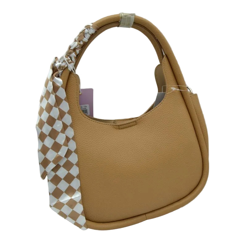 A tan pebbled leather shoulder bag with a woven tan and white checkered scarf wrapped around its handle, shown on a white background.